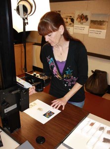Holly Pritchett photographing sherds on the copystand.