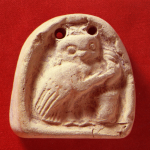 Terracotta relief weight (T.182)